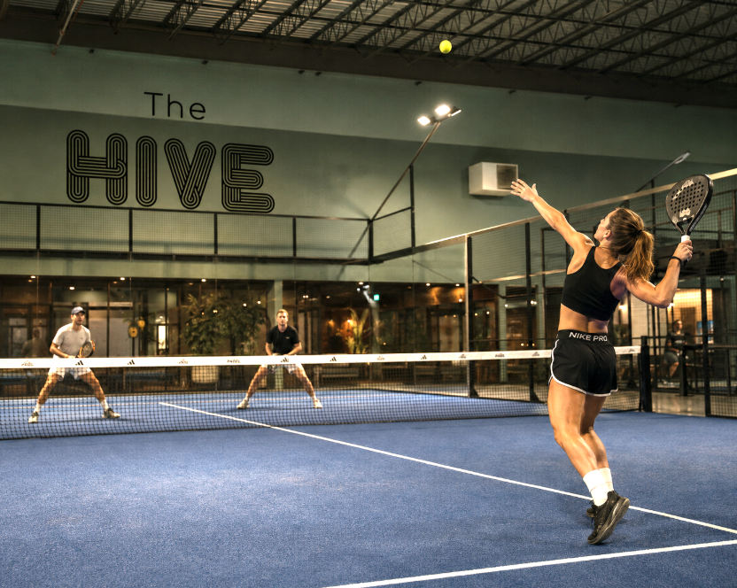 Players on an indoor padel court